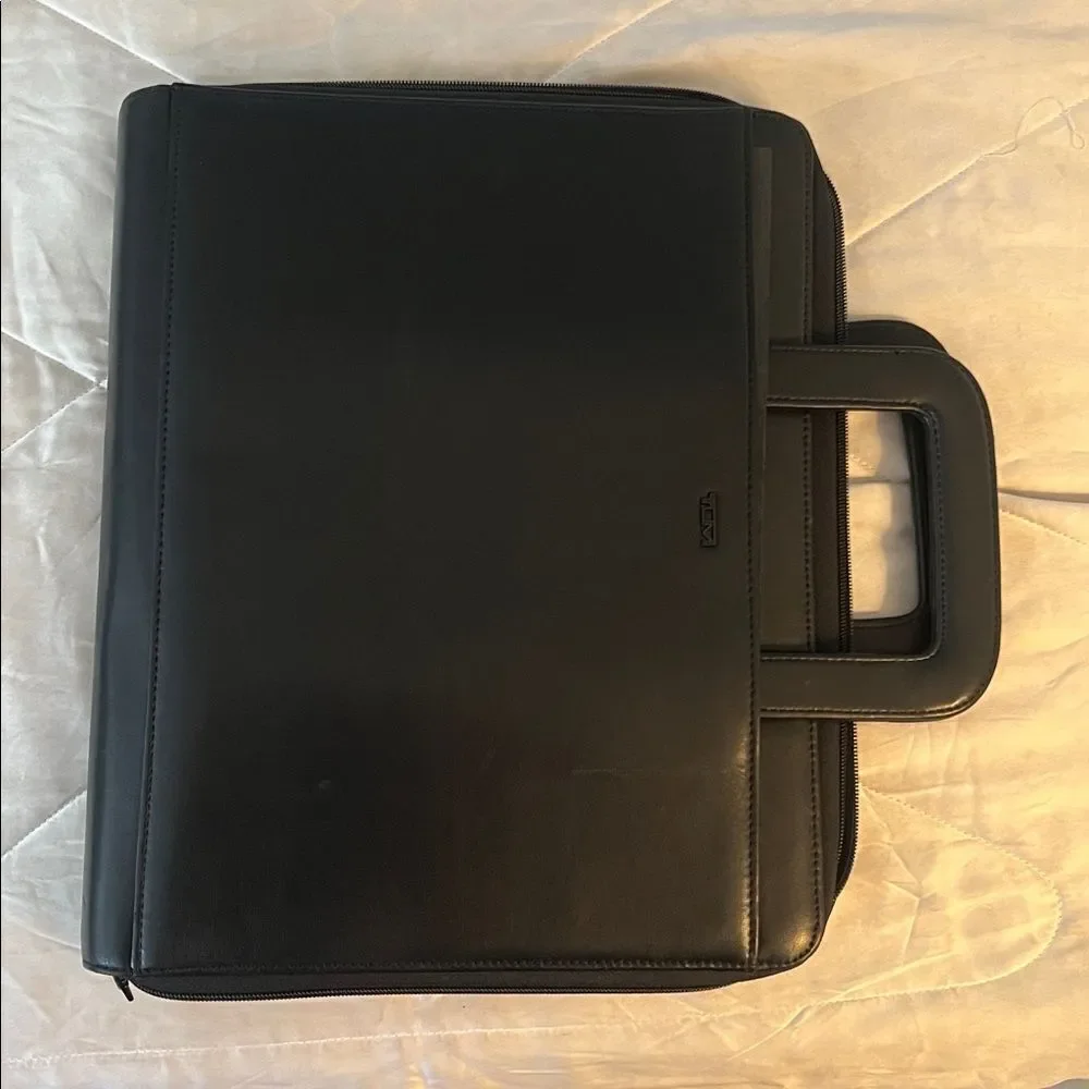 Tumi executive black leather portfolio case with pull out handles